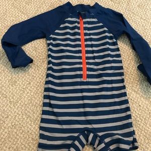 Tea brand size 12-18months swimsuit. Super cute on!